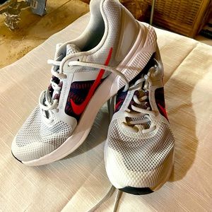 white Nike running shoe